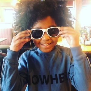 Two small maker marks on the sleeve light brown